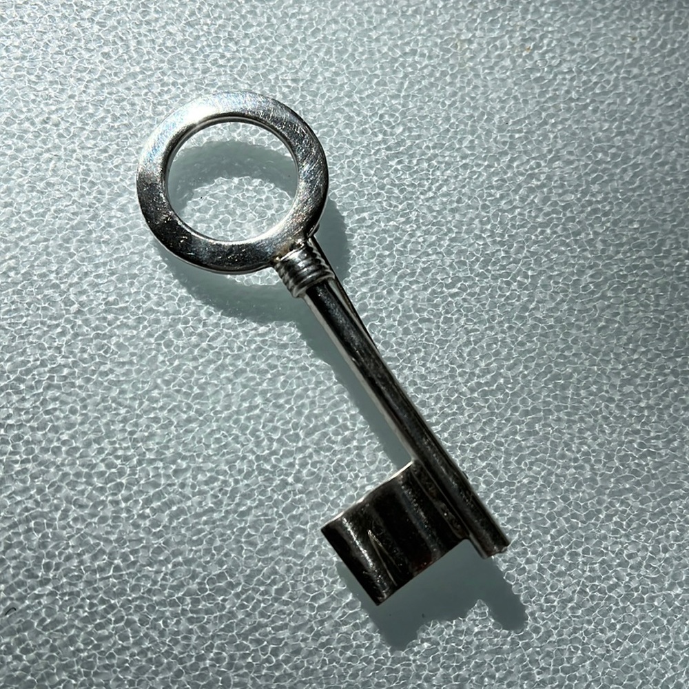 Silver “Key” broach